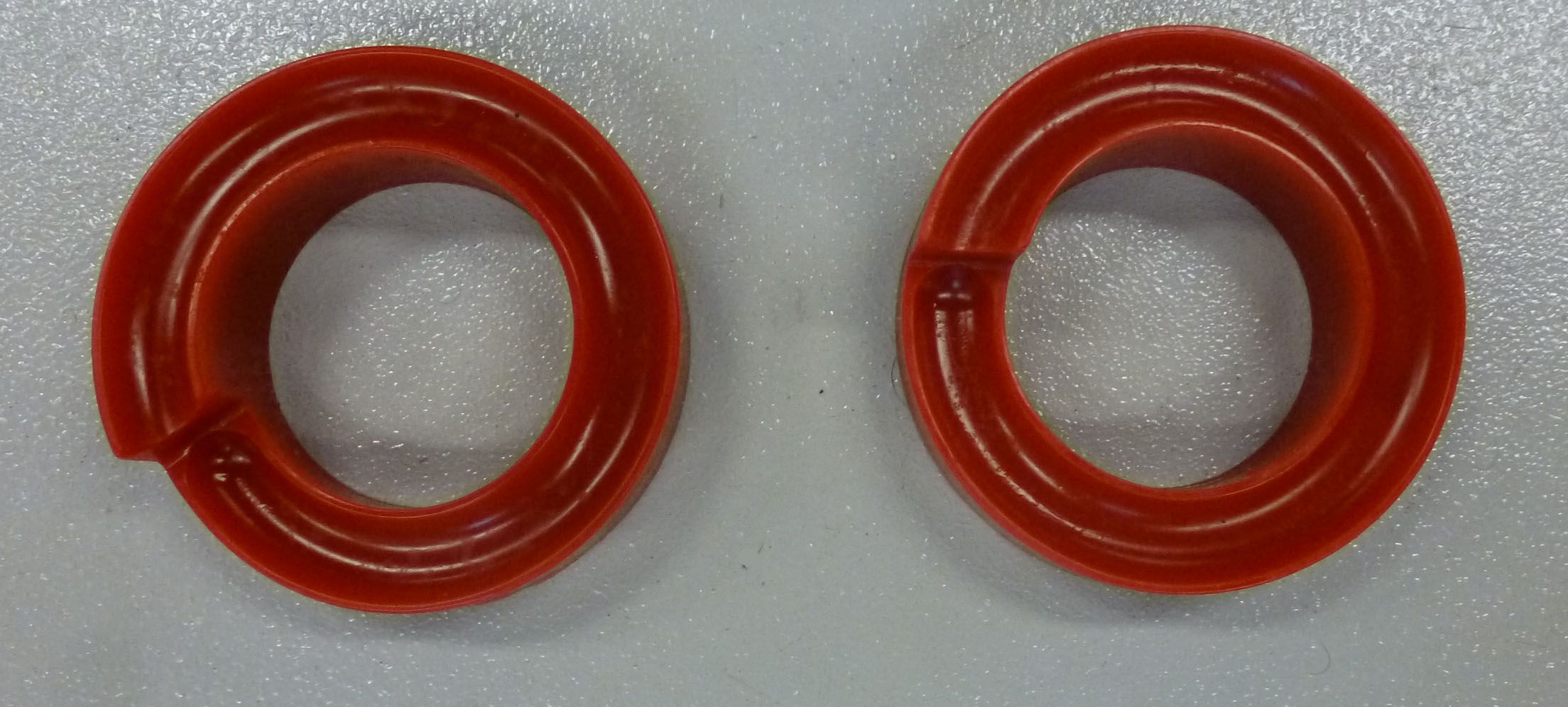 2005-07 Super Duty Coil Spring Isolators Red